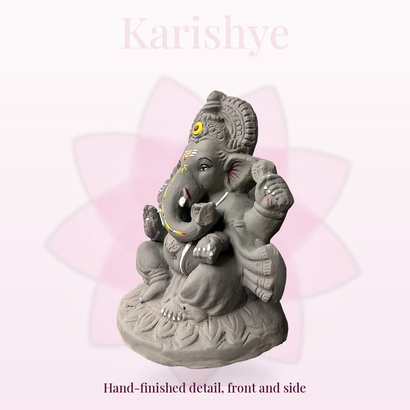Hand-finished river clay Ganesha, three-quarter view